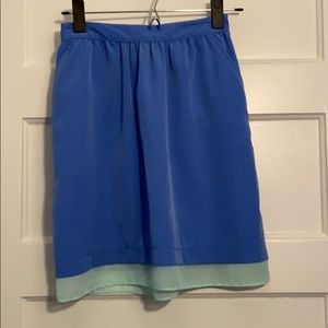 Blue flowy skirt with elastic waist and pockets